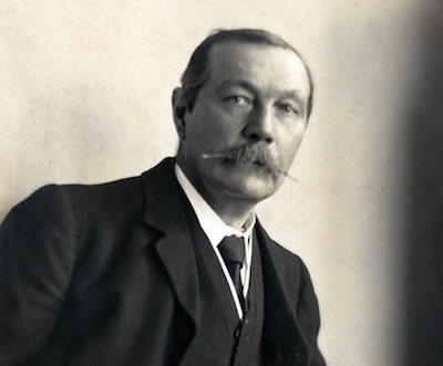 Arthur_Conany_Doyle_by_Walter_Benington_1914-1.png